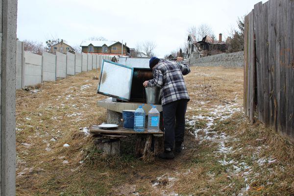 © Ira Sozanska - Drawing water in silenceSerhii, collecting water from a well during the occupation. No supply, no noise, just necessity.