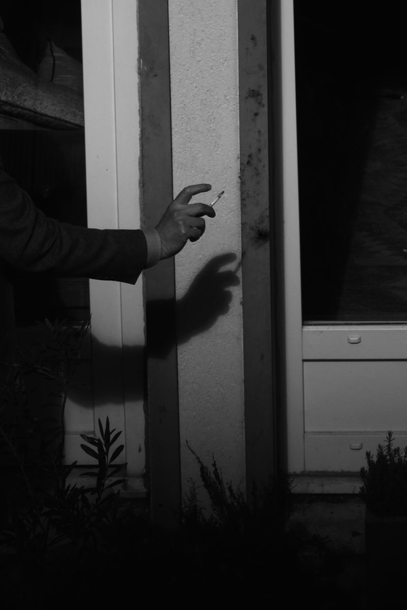 © Anna Kereszty - neighbor's hand wit cigarette