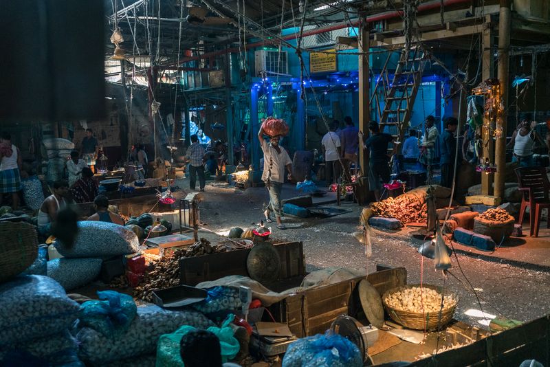 © Mary Catherine Messner - In the Vegetable Market