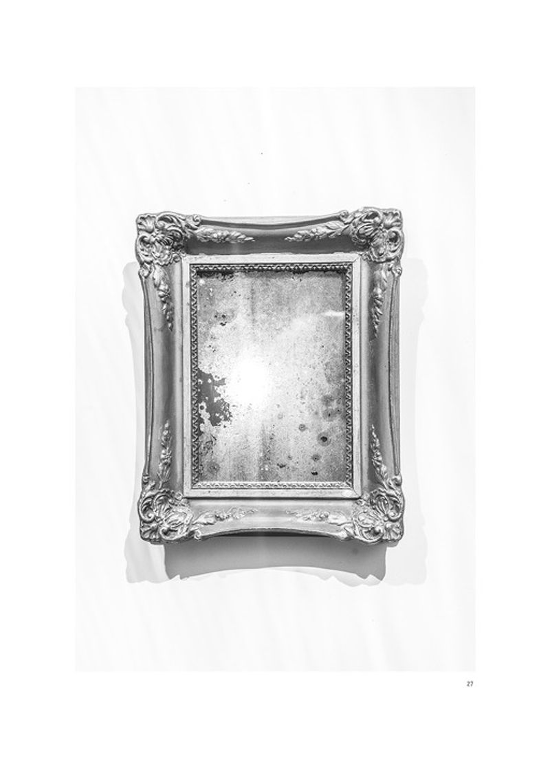 © Gábor Arion Kudász - A small mirror from her bathroom. The function of this mirror was double. It covered a missing tile too.