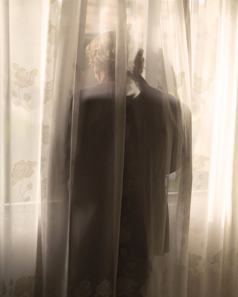 © Margarita V Beltran - Mom behind a house veil.