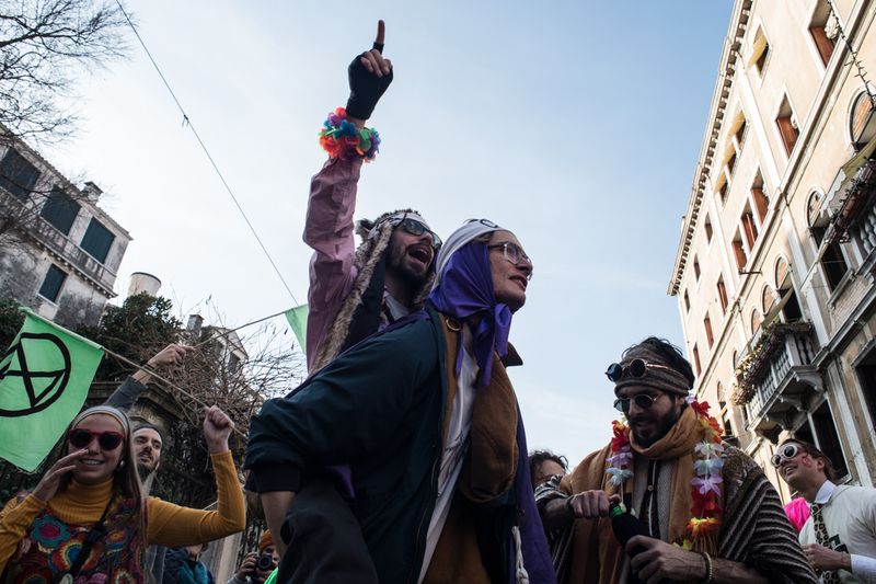 © Maria Giulia Trombini - Disc-obedience action during the Venice Carnival, Venice.