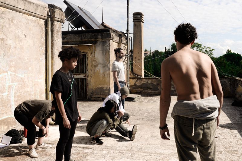 © Maria Giulia Trombini - Yoga in the morning on the rooftop of the Xr Home Base, Rome.