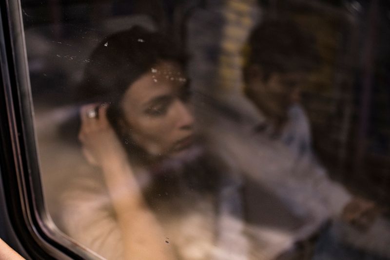 © Maria Giulia Trombini - Ludo, Nico’s girlfriend, in the subway, Nico sits next to her. Naples, March 2021