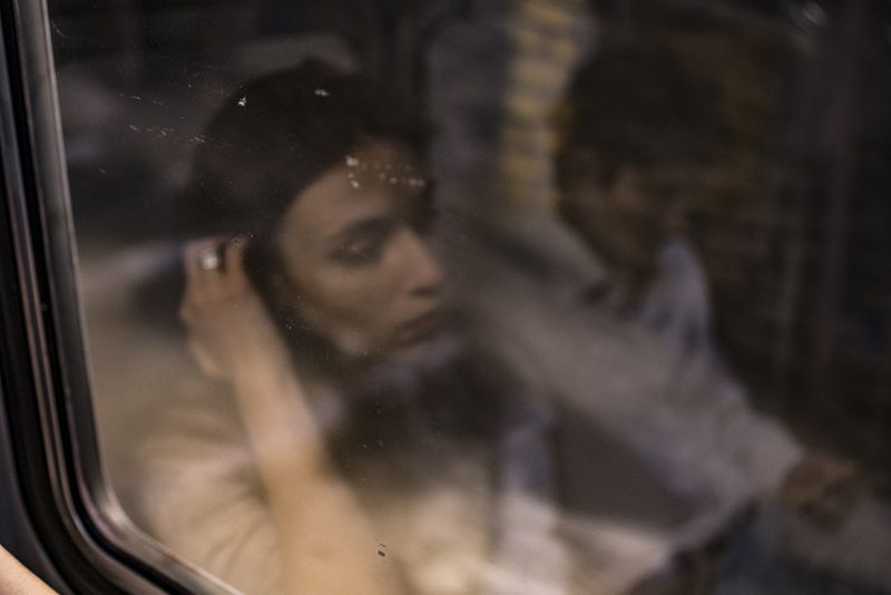 © Maria Giulia Trombini - Ludo, Nico’s girlfriend, in the subway, Nico sits next to her. Naples, March 2021