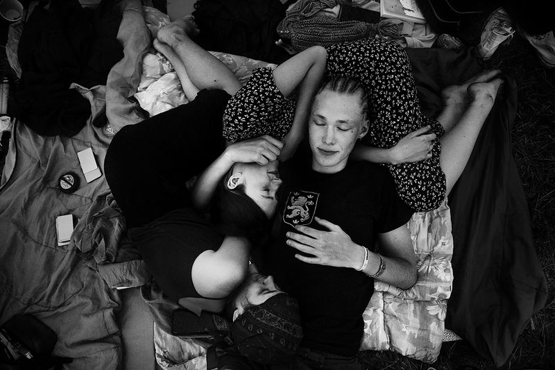 © Maria Giulia Trombini - Volodymyr hugs Sasha and Hrysta in their shared tent during Floating Castle Art Festival. Kozarisce, Slovenia.