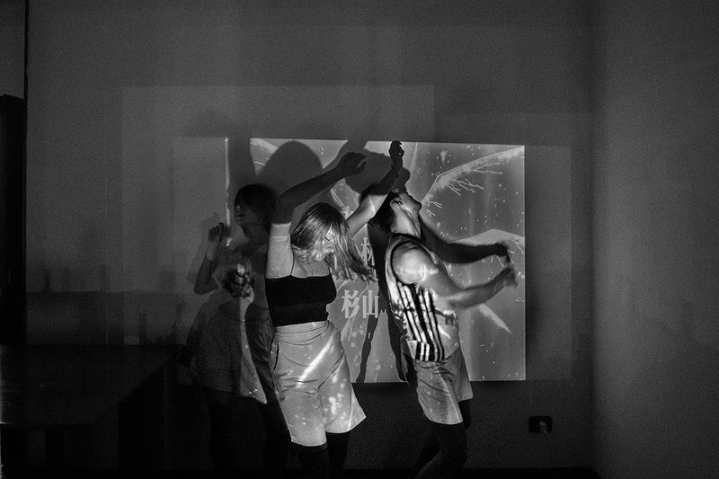 © Maria Giulia Trombini - Nastya (L), Sasha (C), Hlib (R), dance late at night in the living room of the CAS house. Verona, Italy.