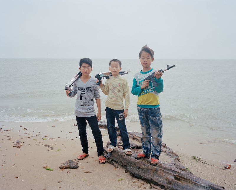 © liang chen - The boy by the sea. 2014  Donghai Island, Guangdong Province, China