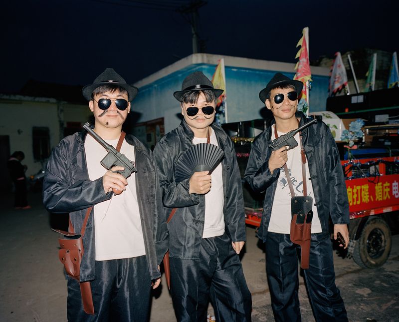 © liang chen - young man playing the role of a "traitor".  Zhanjiang, Guangdong, China 2025