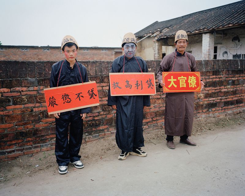 © liang chen - Men play the role of being "criticized and criticized". Zhanjiang, Guangdong, China 2025