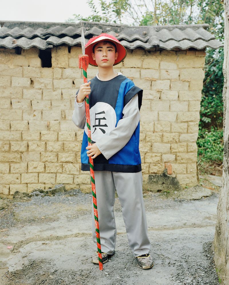© liang chen - A teenager plays an ancient Chinese soldier. 2023 Leizhou, Guangdong, China