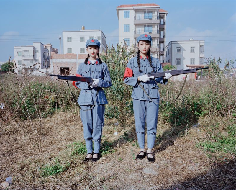 © liang chen - Two young women play the role of the "Eighth Route Army". 2023 Donghai Island, Guangdong Province, China
