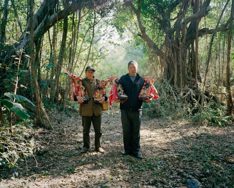 © liang chen - Chen Nafu (left) and Chen Wangrong (my father) escort the village idols. 2014 Donghai Island, Guangdong Province, China