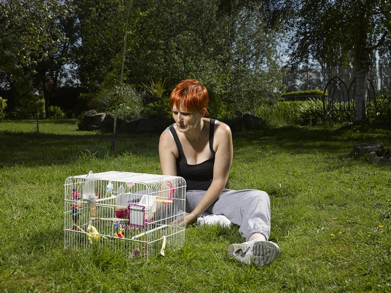 © Richard Ansett - Debbie with Budgerigar