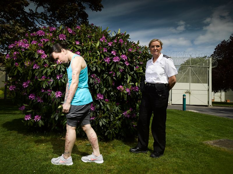 © Richard Ansett - Anna with Rhododendron and prison officer