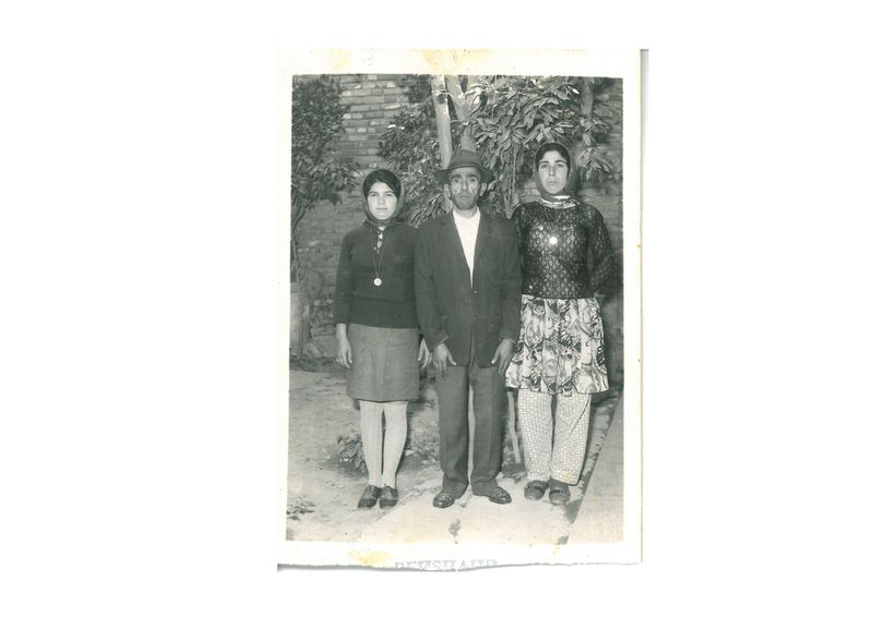 © masoumeh bahrami - This photo shows my mother and my aunt beside my grandfather.