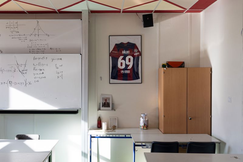 © Noémi Napsugár Melegh - His friends hung his football jersey on the classroom wall and placed handwritten messages in a bottle.