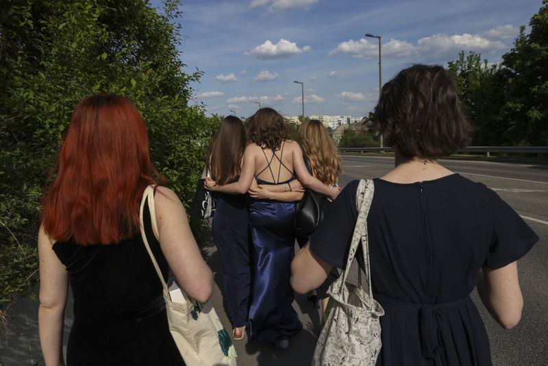 © Noémi Napsugár Melegh - My brother’s classmates are going for the graduation ceremony.