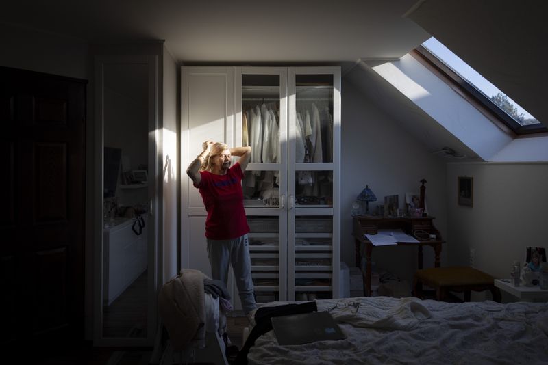 © Noémi Napsugár Melegh - My mother in her room.