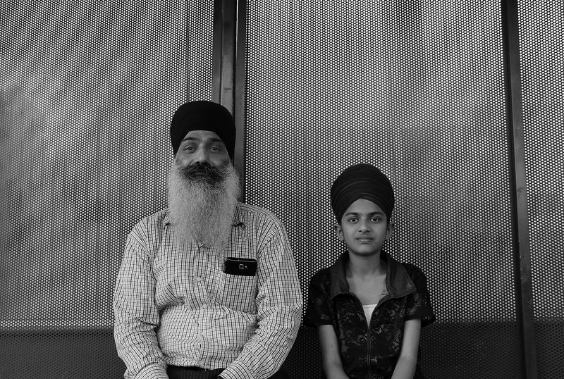 © Julie Grace Immink - Father and daughter waiting for a bus