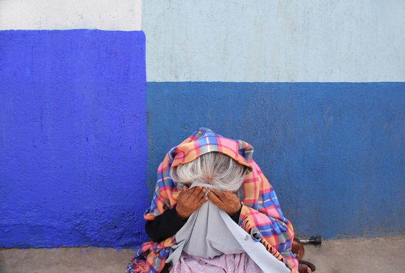 © Julie Grace Immink - Woman saying a prayer