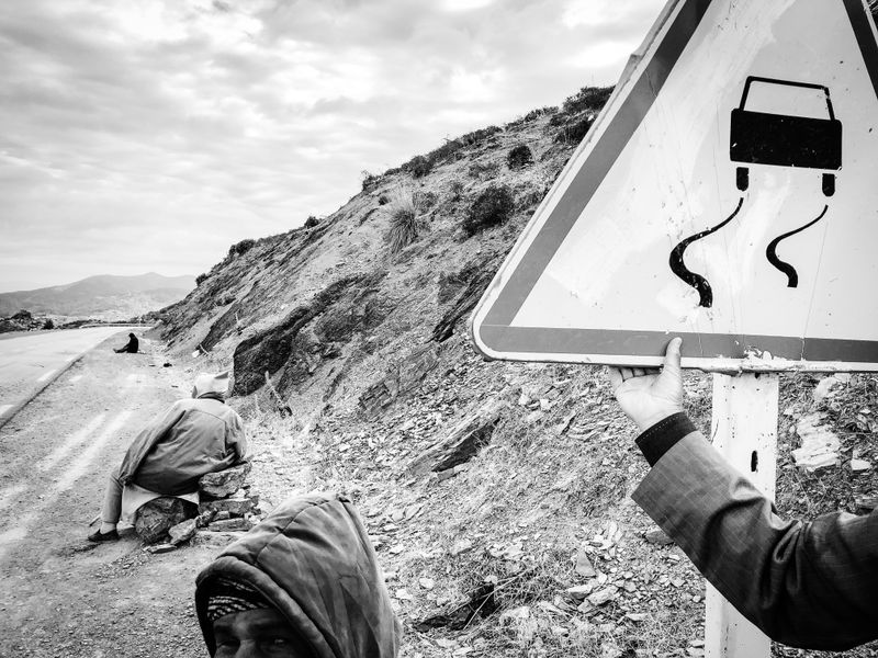 © Fethi Sahraoui - Blind persons sitting by the roadside waiting for the help of passersby, Kahwet El Rih, Algeria, 2020
