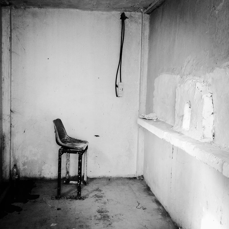 © Fethi Sahraoui - An empty ticket office during a football match.