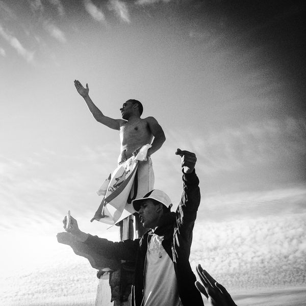 © Fethi Sahraoui - Supporter singing chants for their local football club.