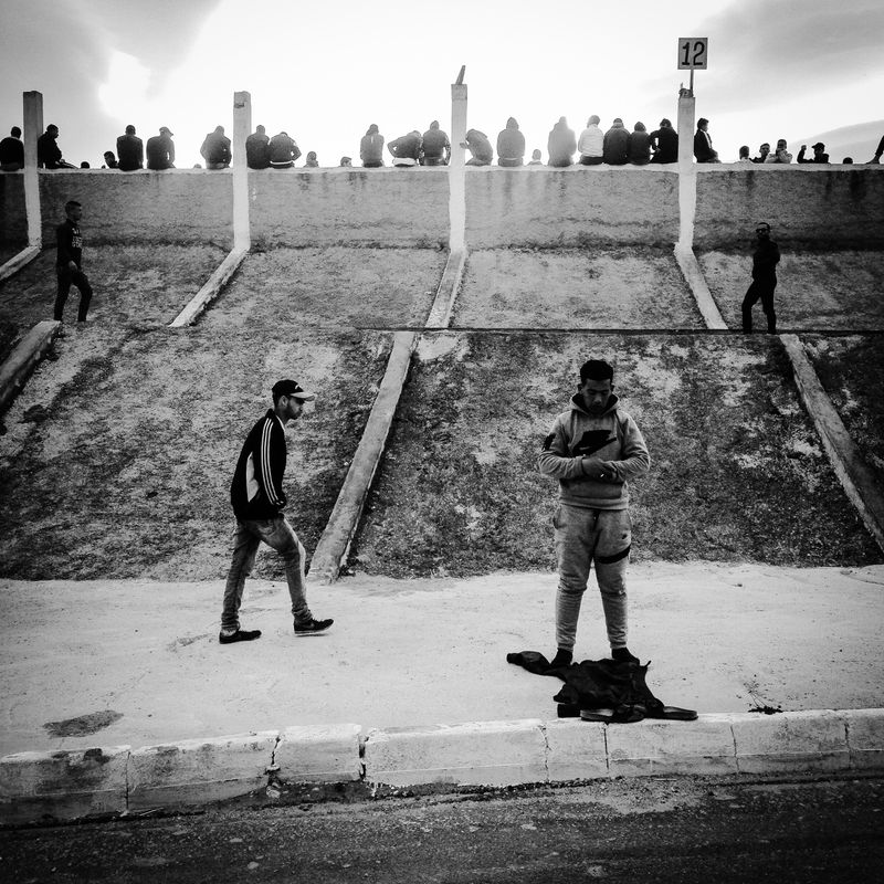 © Fethi Sahraoui - A man doing his prayers.