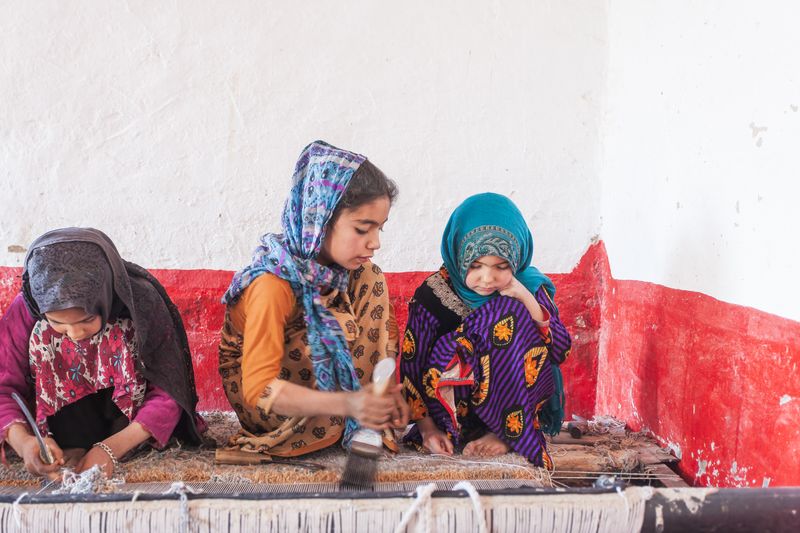 © Agha Waseem Ahmed - Image from the On a Loom of Hope, Under Shadows of Uncertainty, Generations Weave the Fabric of Survival. photography project