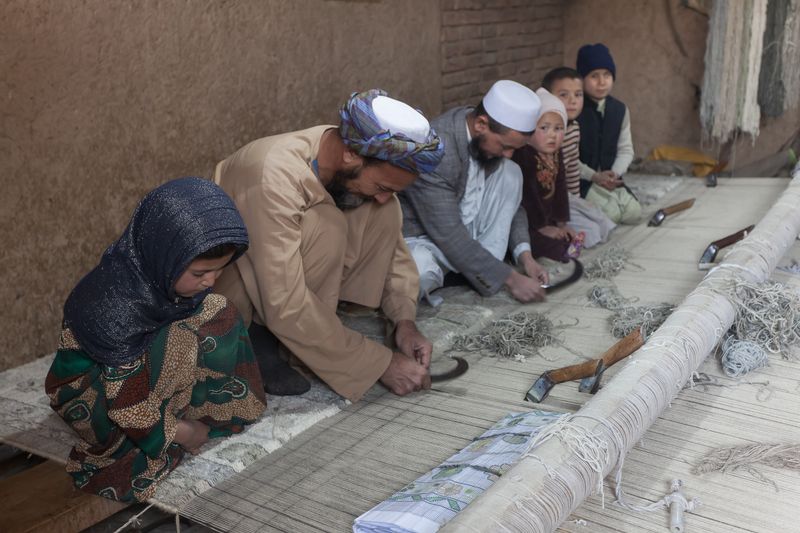 © Agha Waseem Ahmed - Image from the On a Loom of Hope, Under Shadows of Uncertainty, Generations Weave the Fabric of Survival. photography project