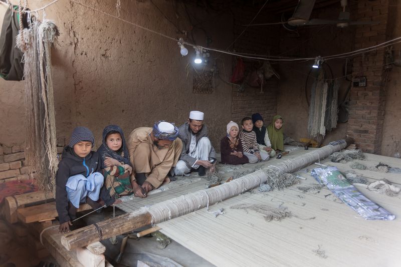 © Agha Waseem Ahmed - Image from the On a Loom of Hope, Under Shadows of Uncertainty, Generations Weave the Fabric of Survival. photography project