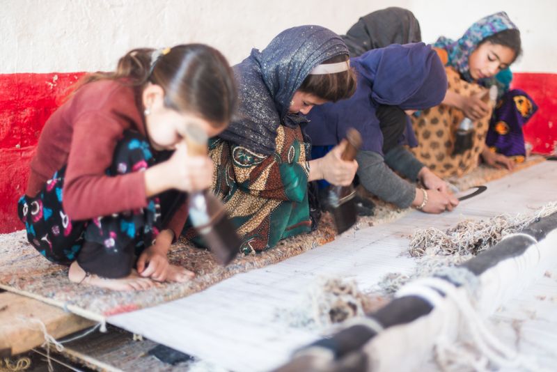 © Agha Waseem Ahmed - Image from the On a Loom of Hope, Under Shadows of Uncertainty, Generations Weave the Fabric of Survival. photography project
