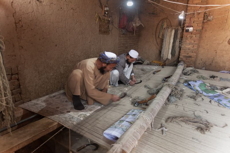 © Agha Waseem Ahmed - Image from the On a Loom of Hope, Under Shadows of Uncertainty, Generations Weave the Fabric of Survival. photography project