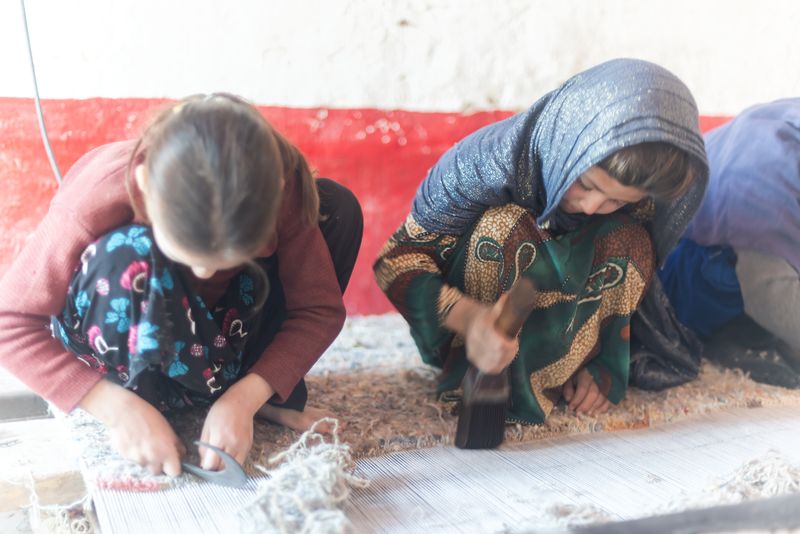© Agha Waseem Ahmed - Image from the On a Loom of Hope, Under Shadows of Uncertainty, Generations Weave the Fabric of Survival. photography project