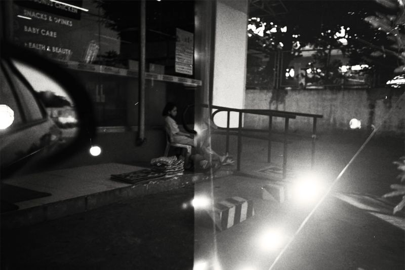 © Angela Galia - Two little kids working at a convenience store.