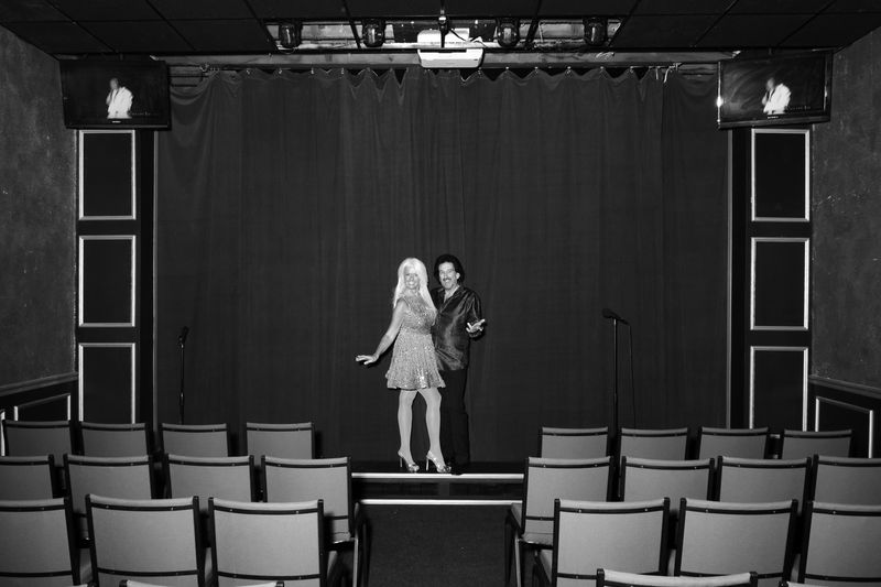 © Sam Gulliver - A magician/Elvis impersonator and his assistant.