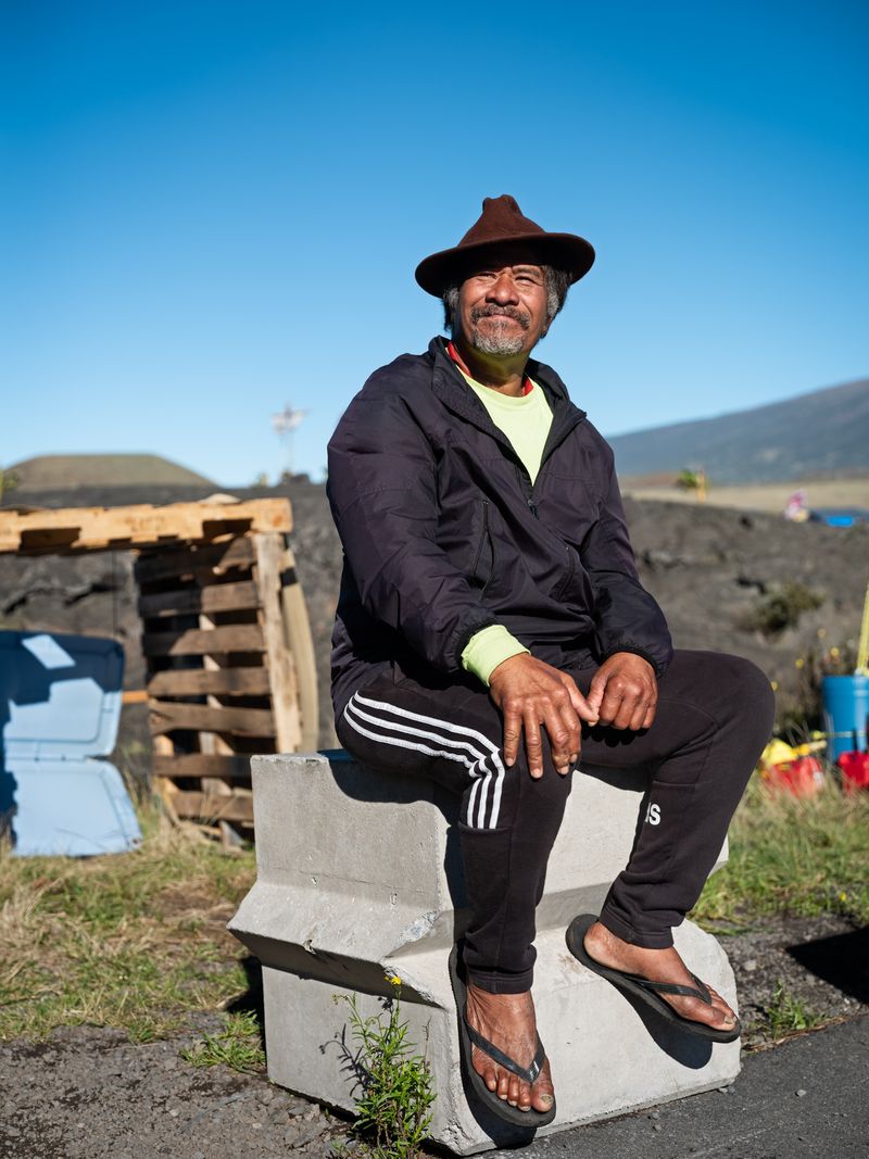 © Molly Peters - Uncle Sam, a fisherman from O’ahu, is a beloved and dedicated kia’i who helps with all aspects of life in the camp.