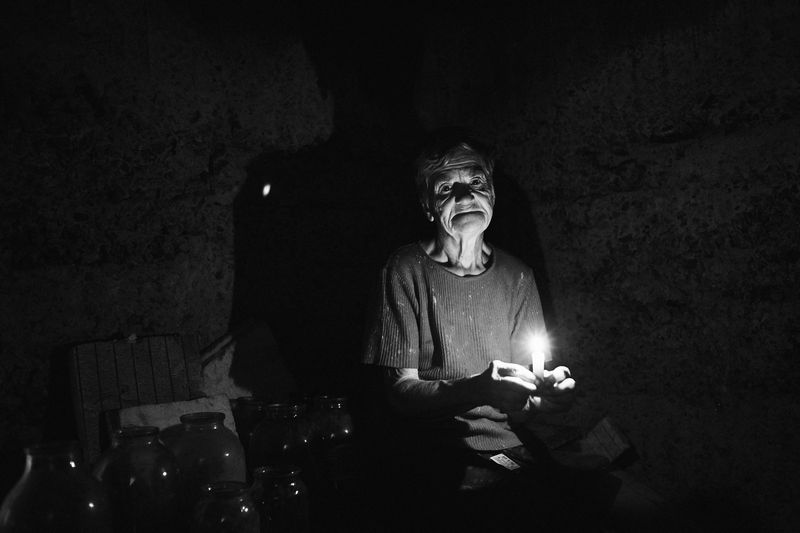 © Valery Melnikov - Catherine Churkina, 75 y.o. resident of the Veseloe village.The village of Veseloe is located near the Donetsk airport.