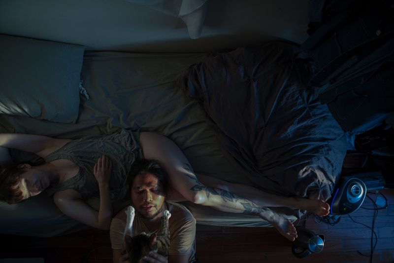© Olga Fe - Pratya and Olga relaxing in bed.