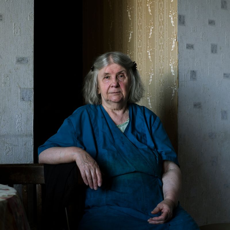 © Maria Quigley - Babushka sits beside the kitchen table.