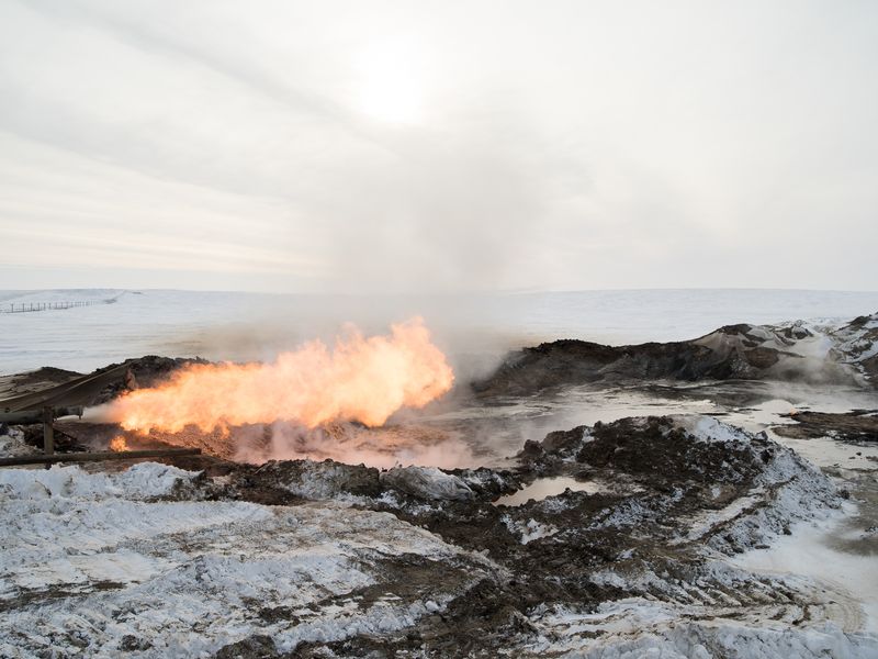 © charles xelot - Flare in the tundra. After drilling a well the gas is burn until pressure stabilized.