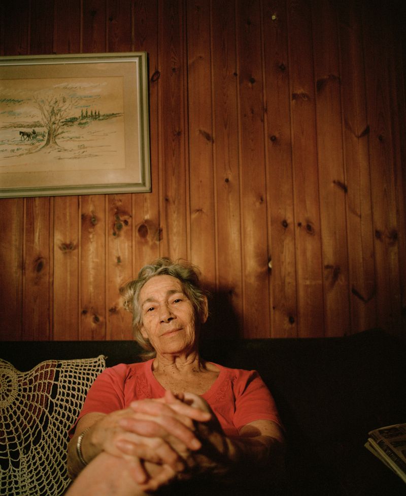 © Dana Golan - My grandmother, Avigail, in front of a wall that her father built when he lived in the same apartment.