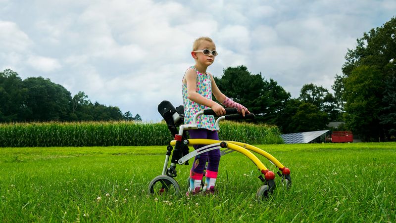 © Karen Haberberg - ADDIE IS NON-VERBAL YET SHE IS A DAREDEVIL WHO LOVES TO CLIMB AND BOUNCE.