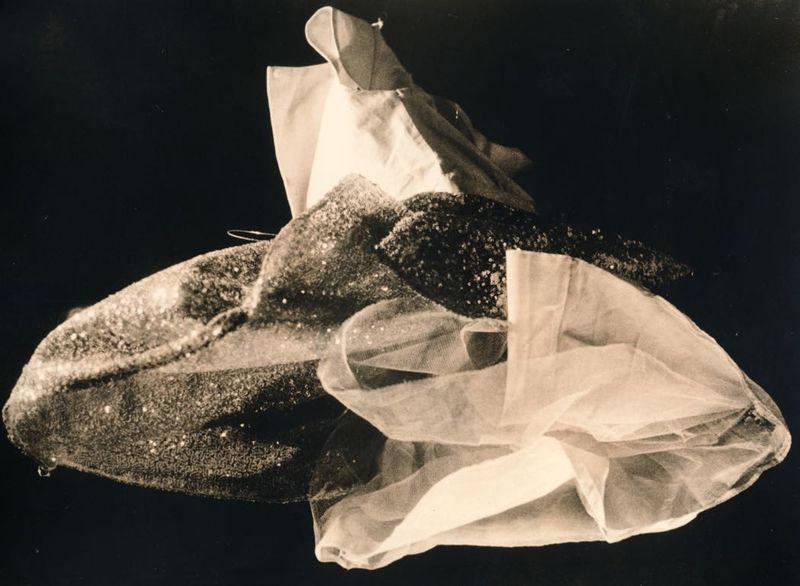 © Jo Stapleton - Child's party dress lit and shot from below (Lith print)