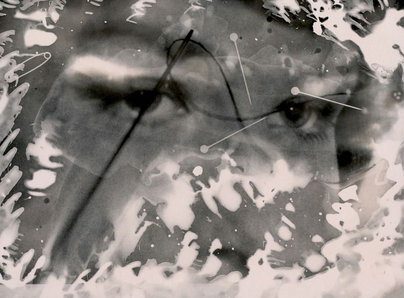© Jo Stapleton - Eyes with sewing equipment. Found 1940s negative rephotographed on a light box with sewing equipment (B&W Chemigram print)