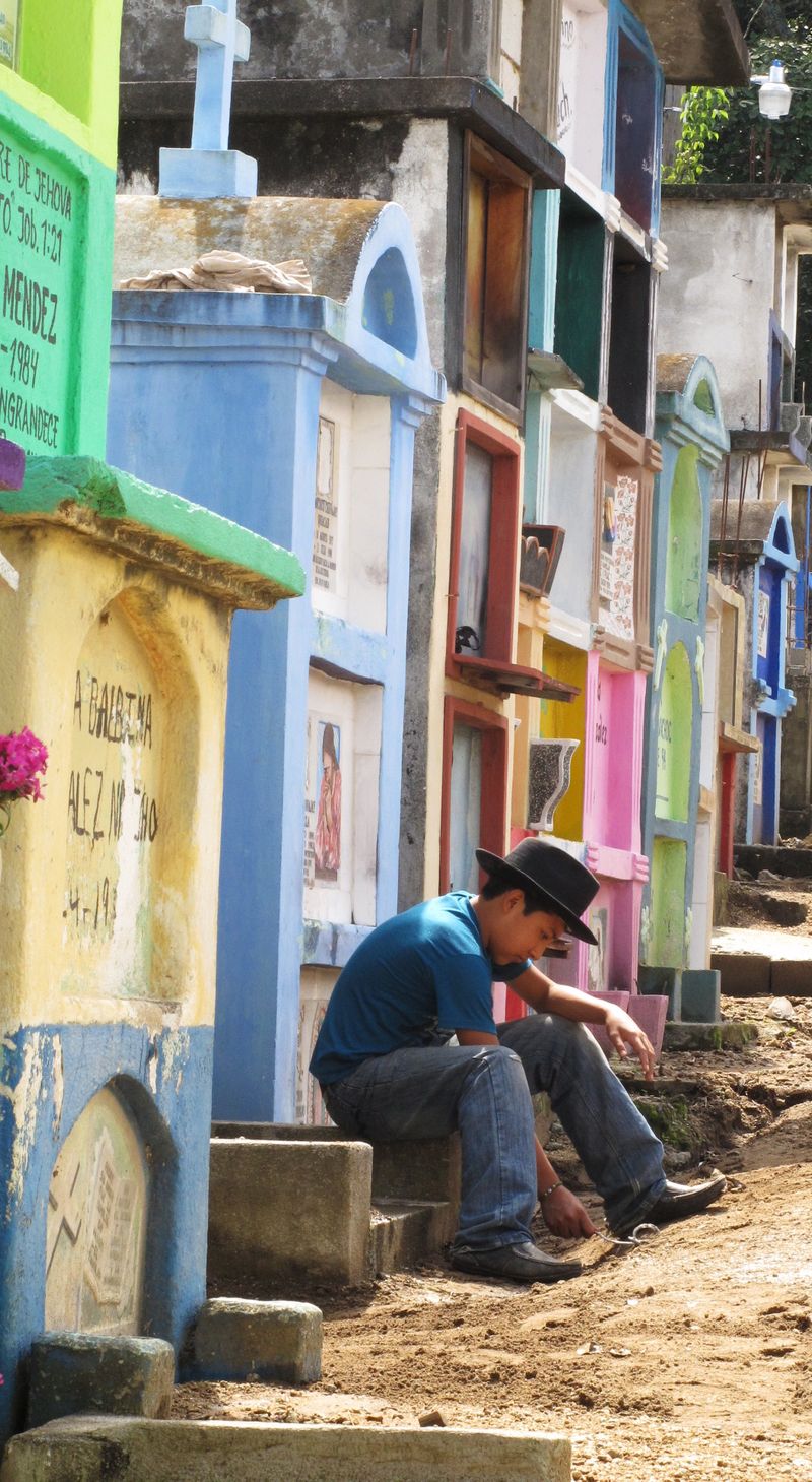 © Cristina Erdmann - "Cemetery thoughts" San Pedro la Laguna, Lake Atitlán, Guatemala, 2015. Young man just hanging out at the local cemetery.