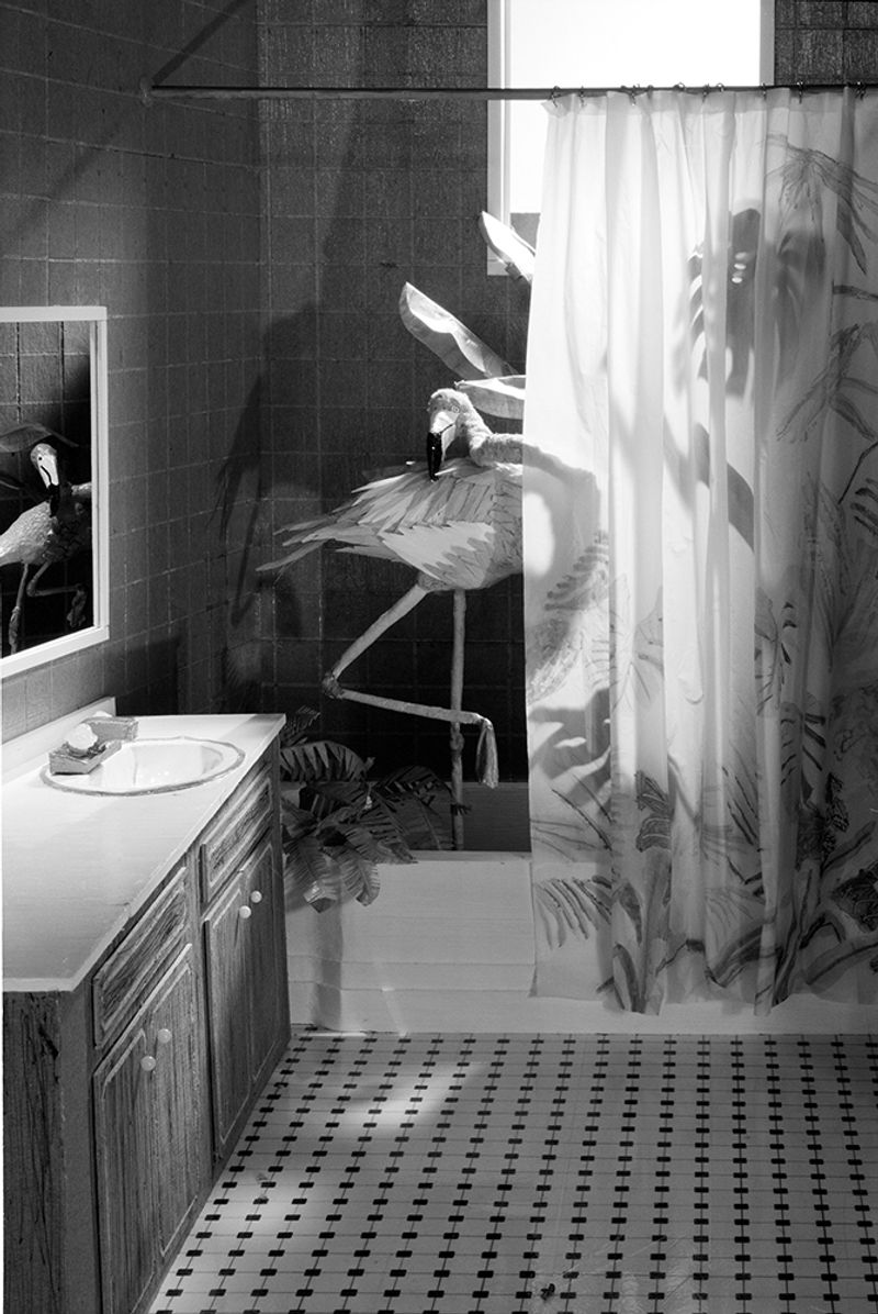 © Robin Crookall - Shower Scene, Gelatin silver print, 15 x 22 inches. Photograph of constructed cardboard diorama.
