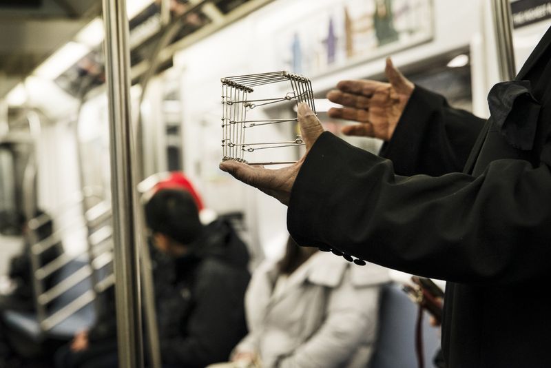 © Jaime Permuth - Christmas Eve, working the 7 train.