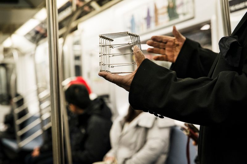© Jaime Permuth - Christmas Eve, working the 7 train.